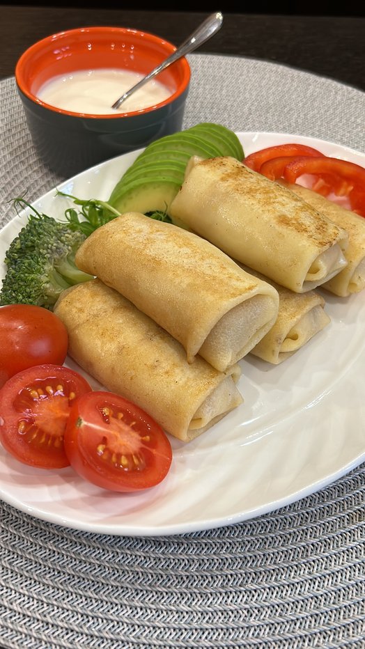 Pancakes with chicken, mushrooms, and cheese