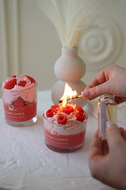 Raspberry dessert candle is scented.