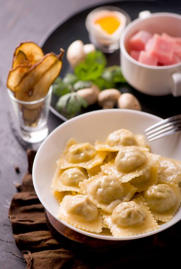 Ravioli with turkey, mushrooms, and pear